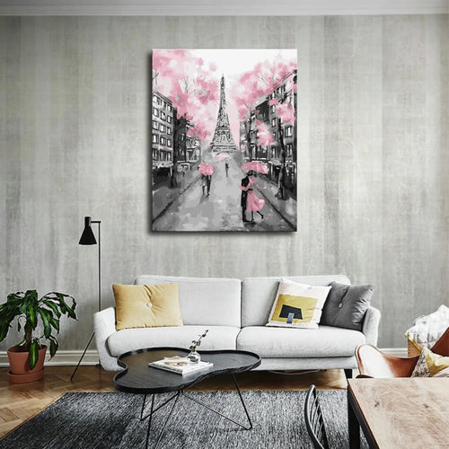 A romantic watercolor scene of Paris features the Eiffel Tower amidst pink blossom trees, with couples under pink umbrellas.